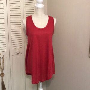 Women’s bathing suit cover size medium.